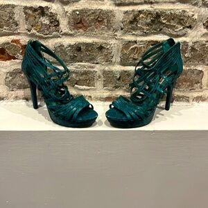 Deep turquoise snakeskin embossed platform.